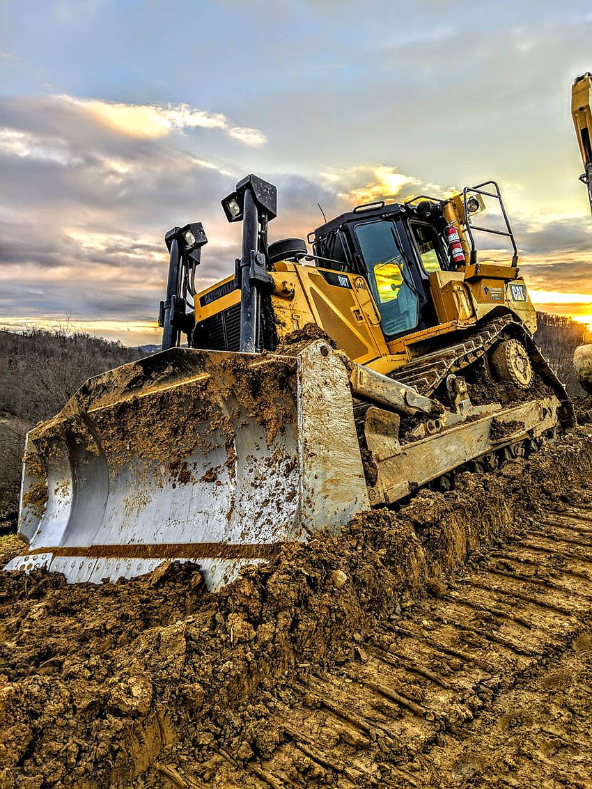 Heavy bulldozer operating in demanding site conditions