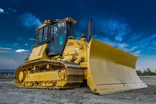CAT bulldozer on a graded construction site